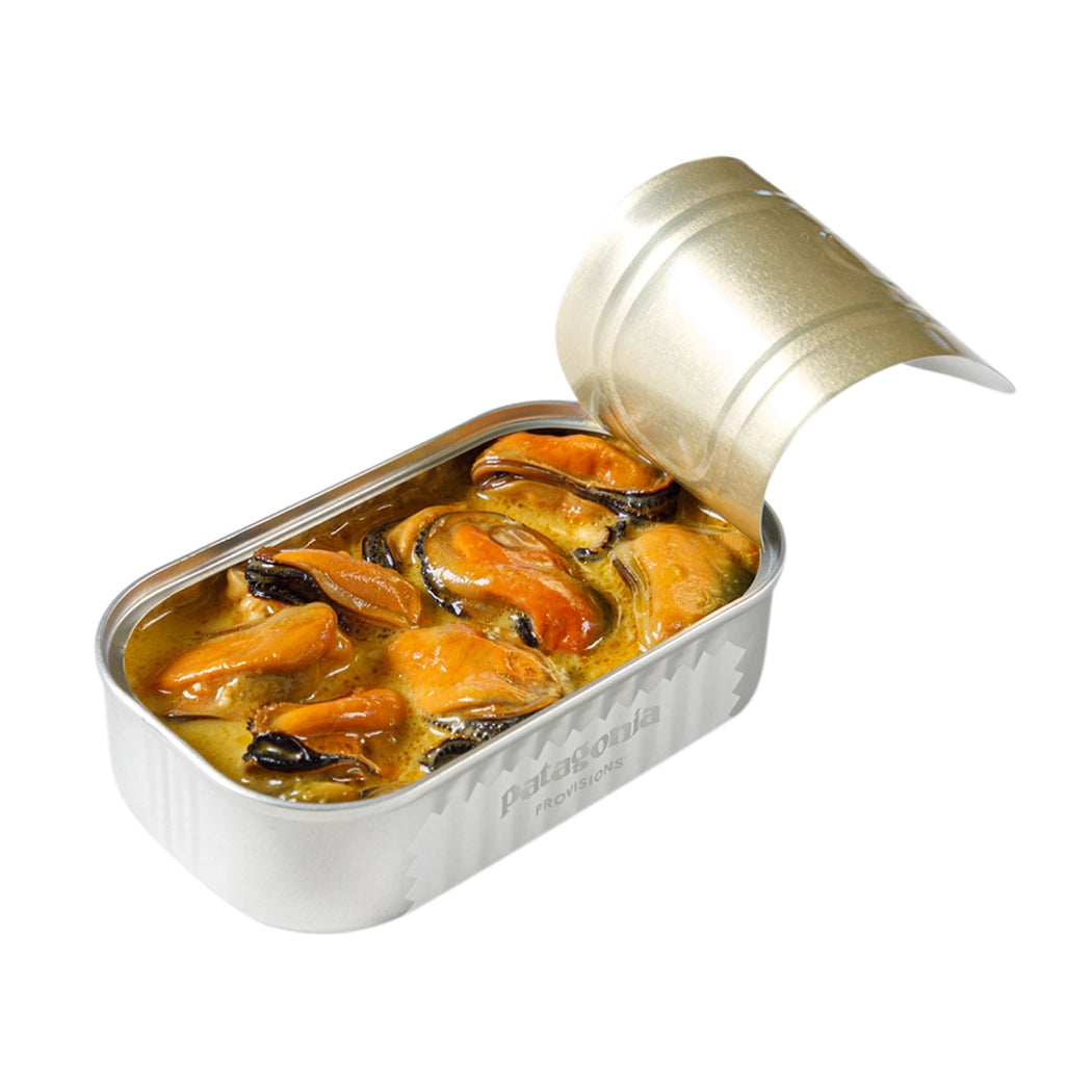 Open can of Patagonia Provisions smoked mussels with a white background