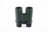 Nocs Provisions Pro Issue 8X Waterproof Binoculars in Alpine Green on a neutral background from above.