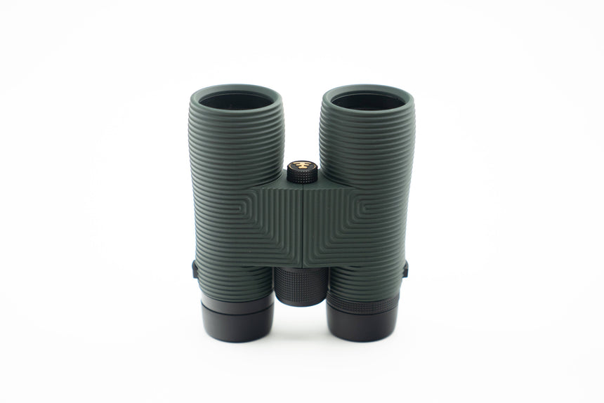 Nocs Provisions Pro Issue 8X Waterproof Binoculars in Alpine Green on a neutral background from above.