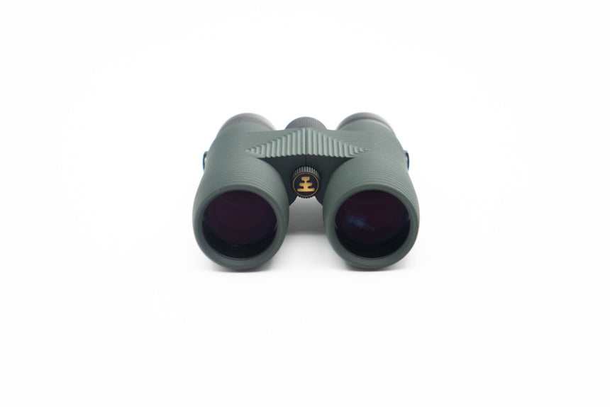 Nocs Provisions Pro Issue 8X Waterproof Binoculars in Alpine Green on a neutral background.