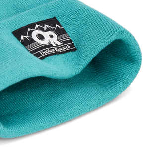 Outdoor Research Juneau Beanie in Tidepool with Outdoor Research logo on a white background