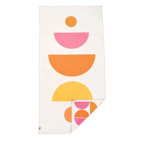 Trek Light Half Moon Wander towel is made from recycled plastic bottles and features a colorful half moon pattern.