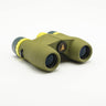 Nocs Standard Issue 10x25 Waterproof Binoculars in olive green on a neutral background.