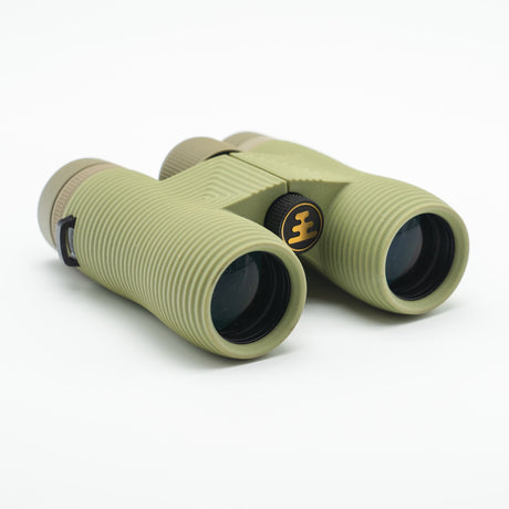 Nocs Provisions Field Issue 10X Waterproof Binoculars in Ponderosa Green on a neutral background.