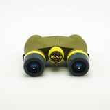 Nocs Standard Issue 10x25 Waterproof Binoculars in olive green on a neutral background.