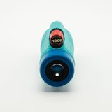 Nocs Provisions Zoom Tube 8x32 Monocular in Tahitian Blue on a neutral background showing the eye piece.