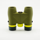 Nocs Standard Issue 10x25 Waterproof Binoculars in olive green from above on a neutral background.