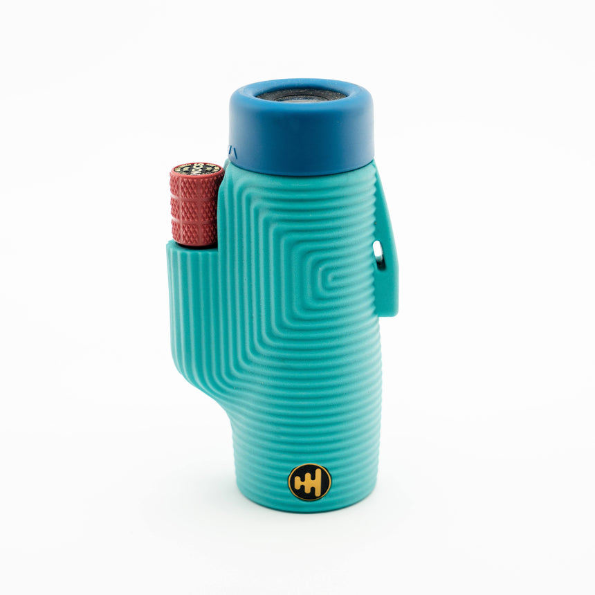 Nocs Provisions Zoom Tube 8x32 Monocular in Tahitian Blue on a neutral background from the side.