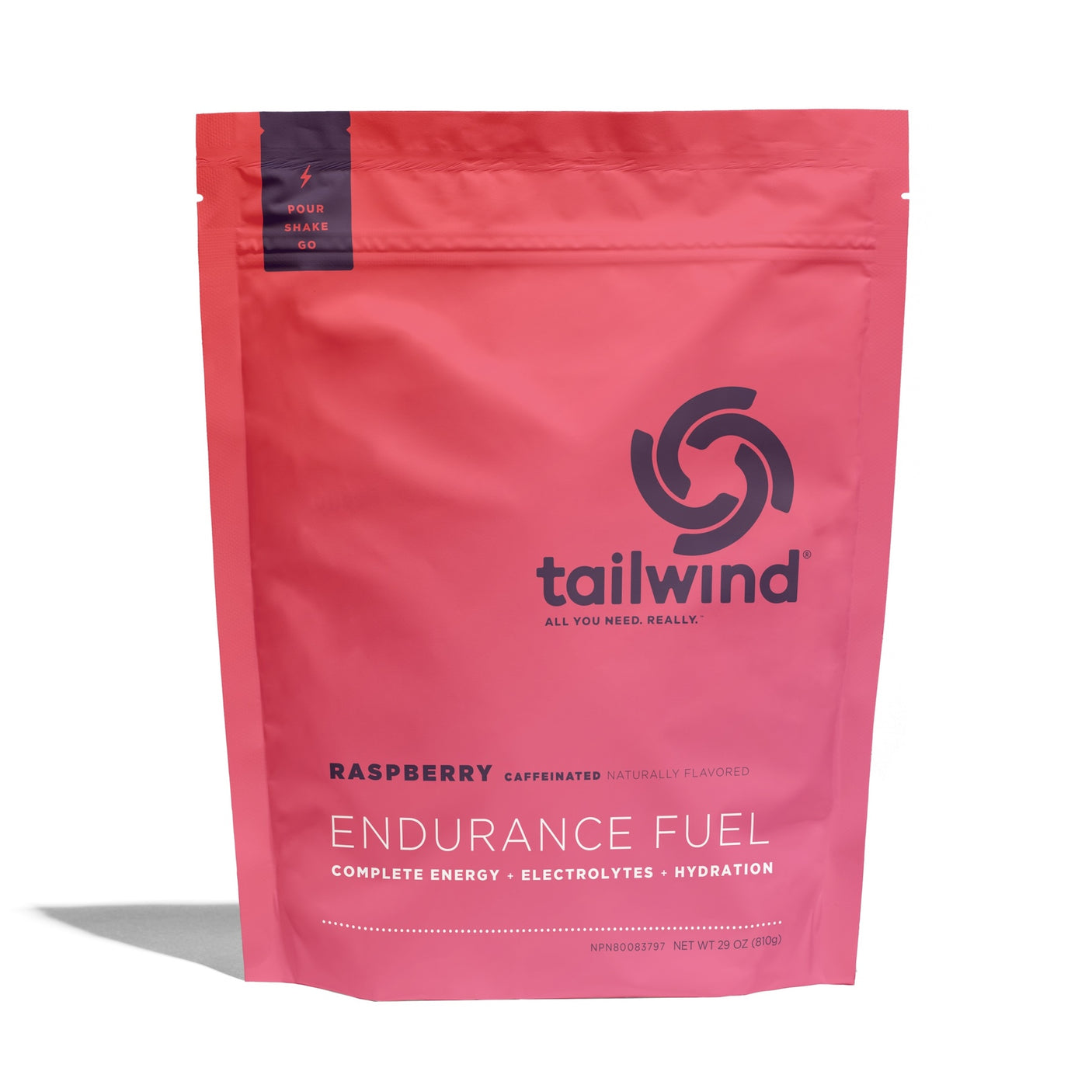 Tailwind Nutrition Endurance Fuel in Raspberry (caffeinated) on a neutral background.