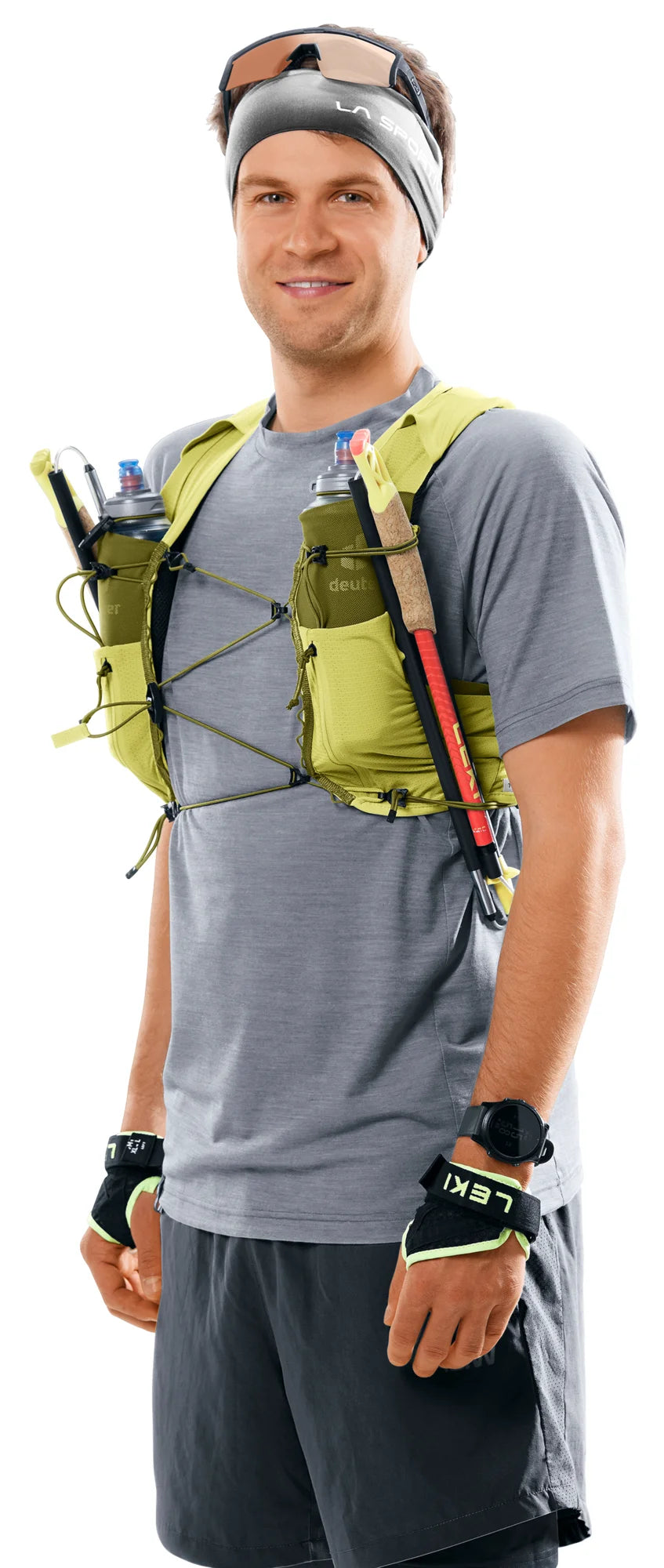 deuter Traick 5 running hydration vest in Sprout-Cactus worn by a man on a neutral background.