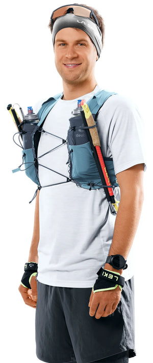 deuter Traick 5 running hydration vest in Atlantic-Ink worn by a man on a neutral background.