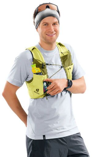 deuter Traick 9 running hydration vest in Sprout-Cactus worn by a man on a neutral background.