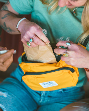 Keep Nature Wild Everyday Fanny Pack is made with recycled nylon and available in marigold yellow.