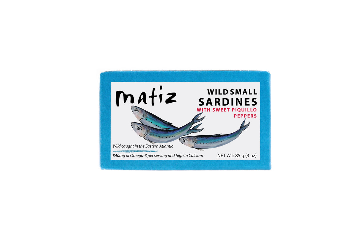 Matiz Wild Small Sardines with Sweet Piquillo Peppers on a neutral background.