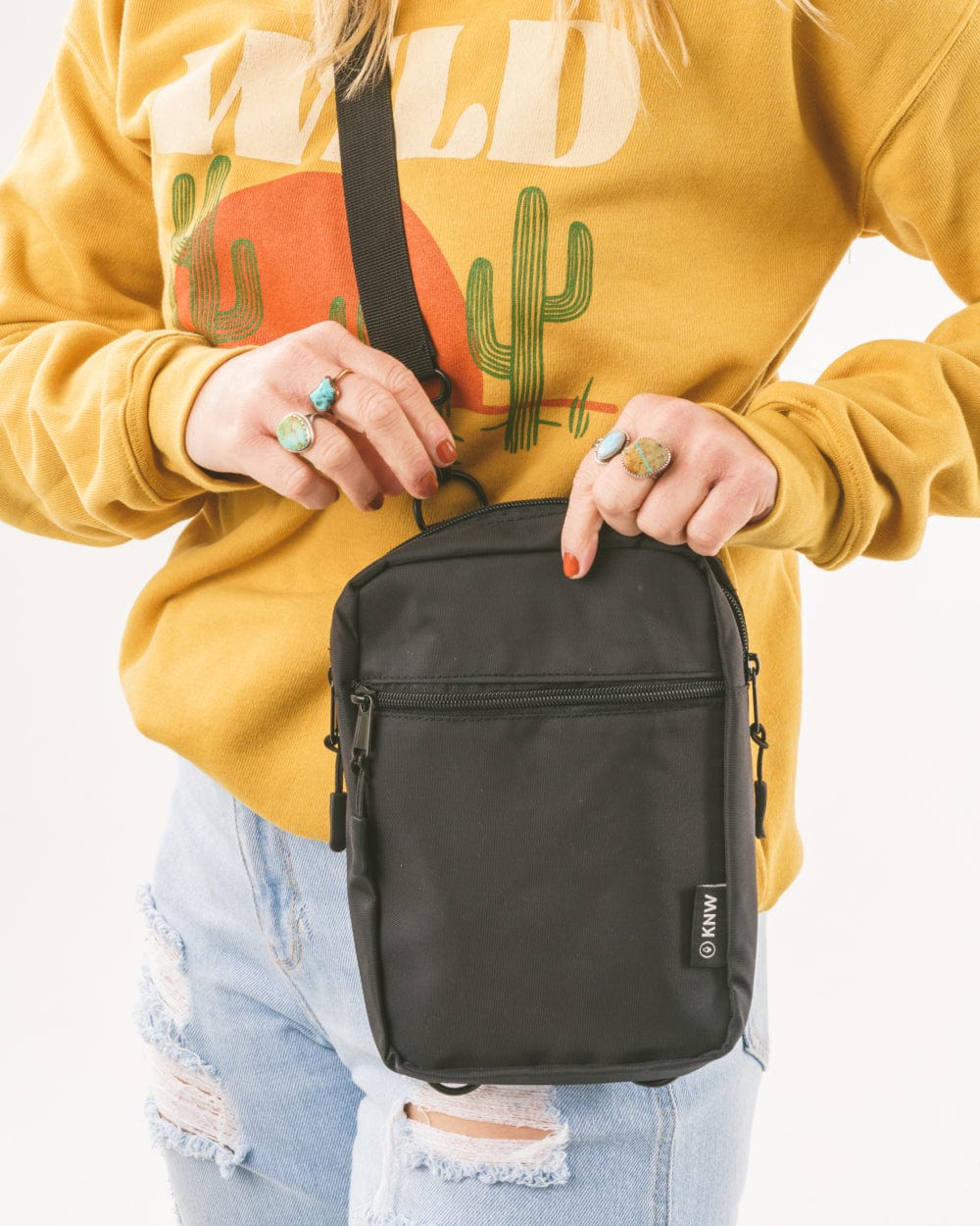 Keep Nature Wild crossbody bag is made from recycled nylon.