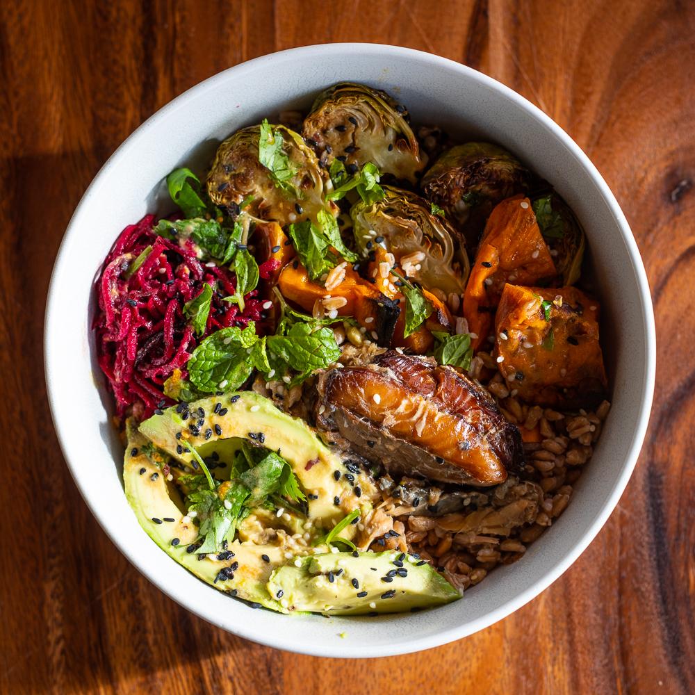 Fishwife Smoked Atlantic Salmon tinned fish mixed in a grains and veggie bowl.