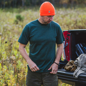 Minus33 Algonquin Merino wool shirt on a man in the outdoors.