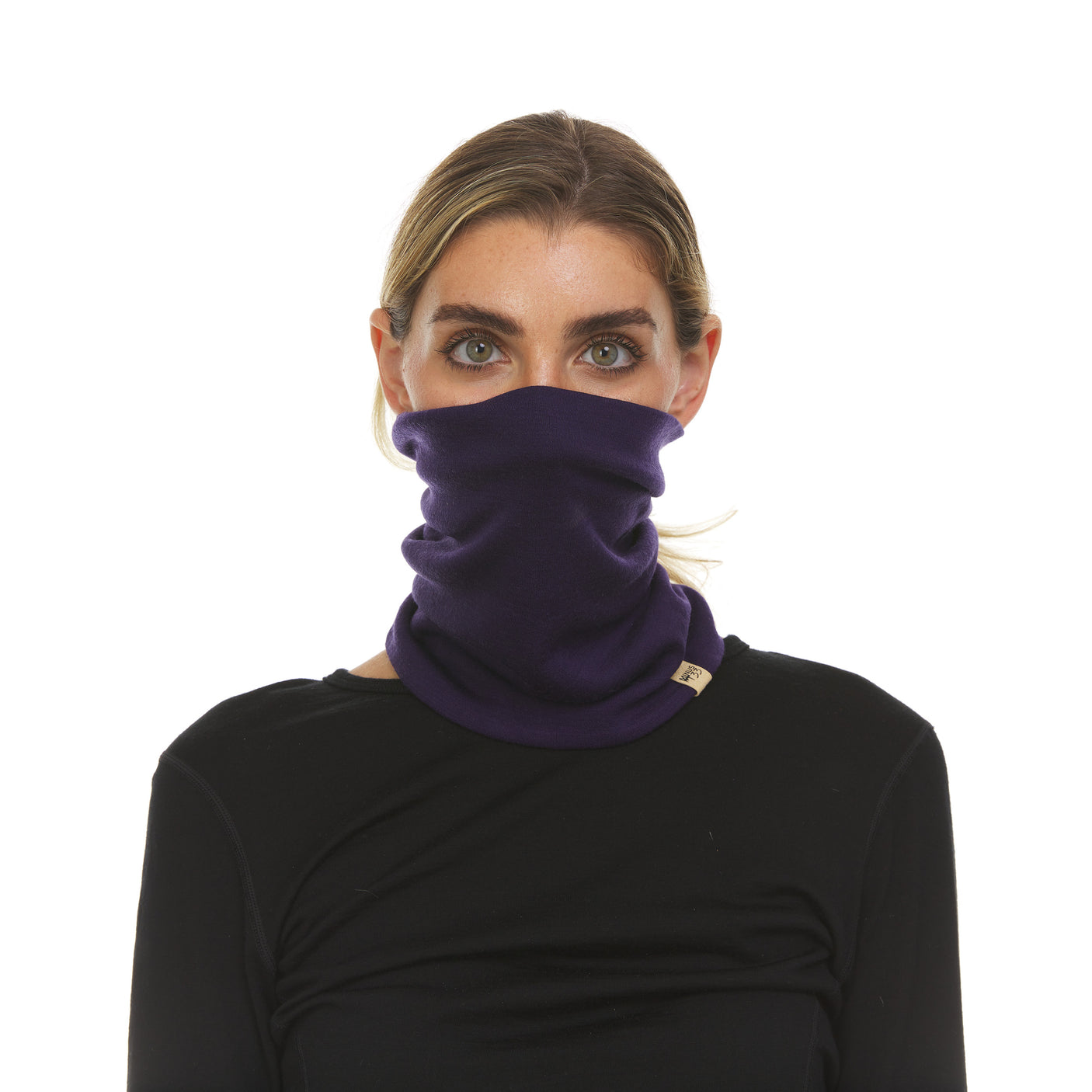 Minus33 Midweight - Neck Gaiter 100% Merino Wool in Dark Purple being worn by a woman on a neutral background.