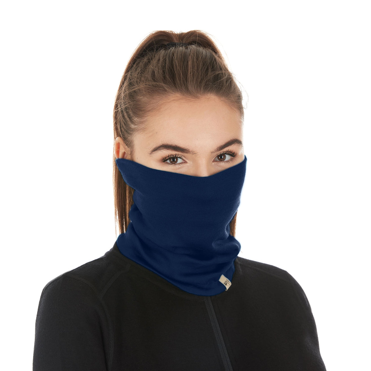 Minus33 Midweight - Neck Gaiter 100% Merino Wool in Navy Blue worn on a neutral background.