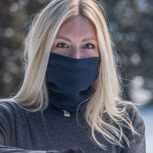 Minus33 Midweight - Neck Gaiter 100% Merino Wool in Navy Blue being worn outdoors.