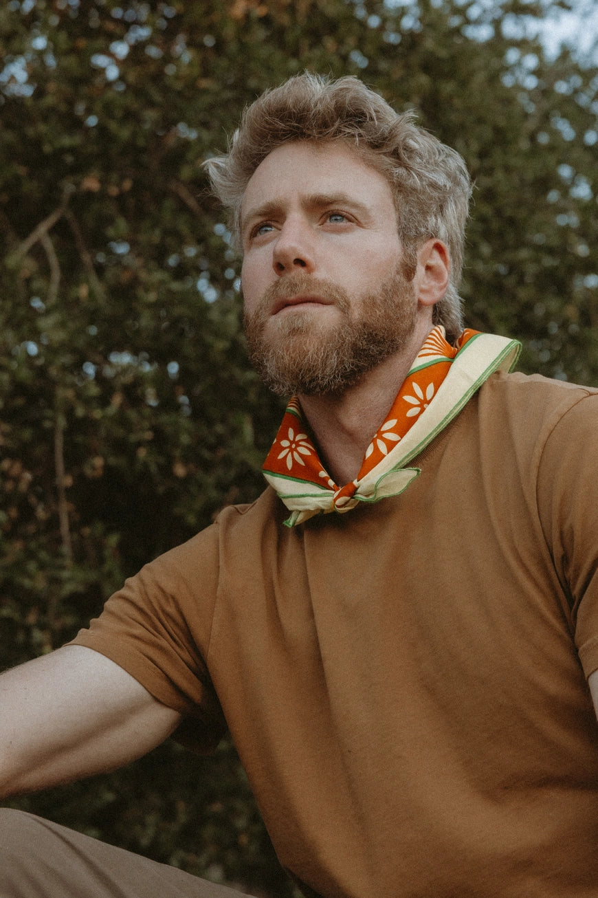 Bandits La Magia De Tochtli Bandana worn by a man outdoors.