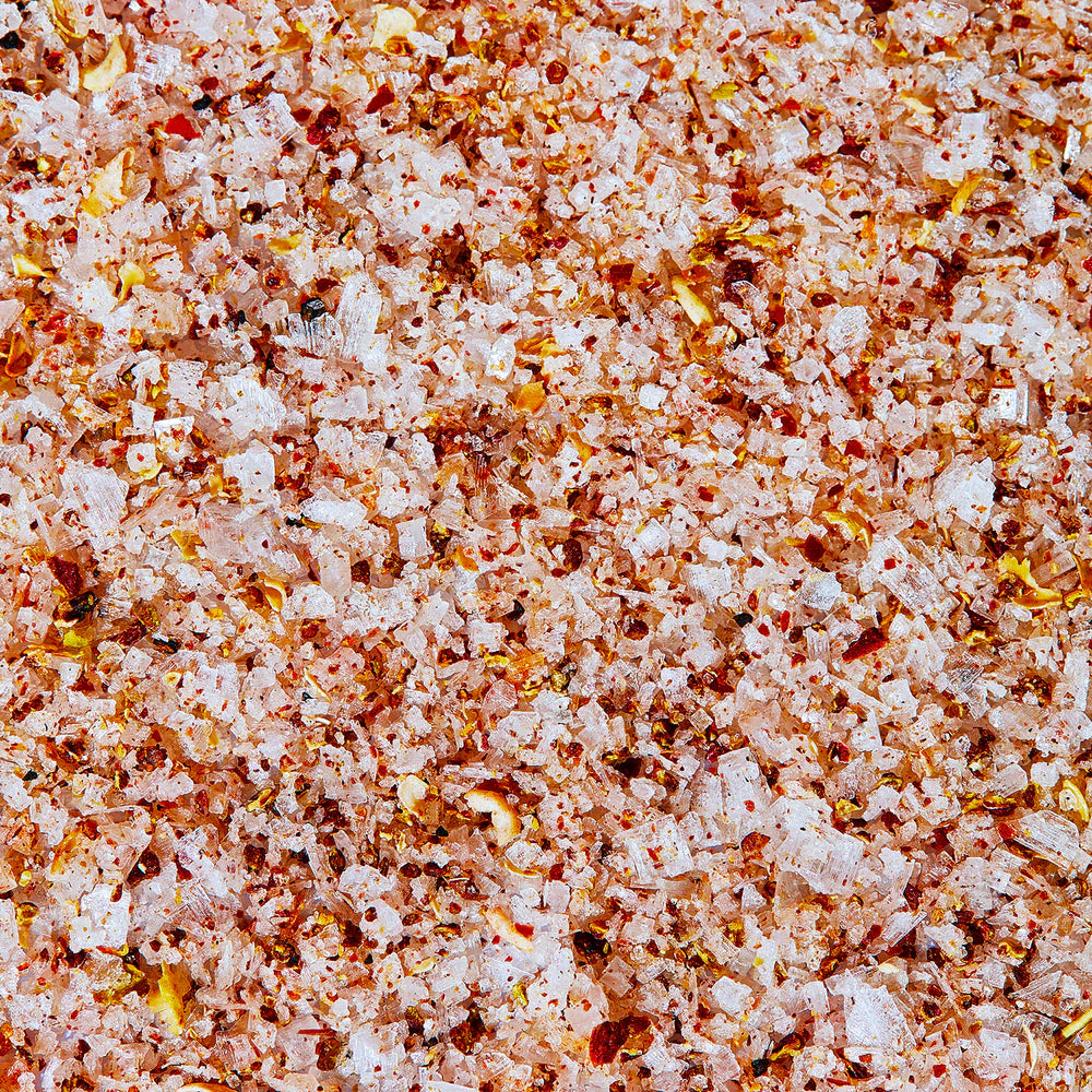 Close-up of JSC x Fly By Jing Tingly Sichuan Salt with small particles and specks