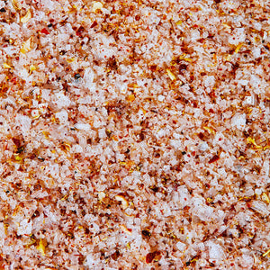 Close-up of JSC x Fly By Jing Tingly Sichuan Salt with small particles and specks