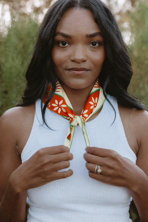 Bandits La Magia De Tochtli Bandana worn by a woman outdoors.