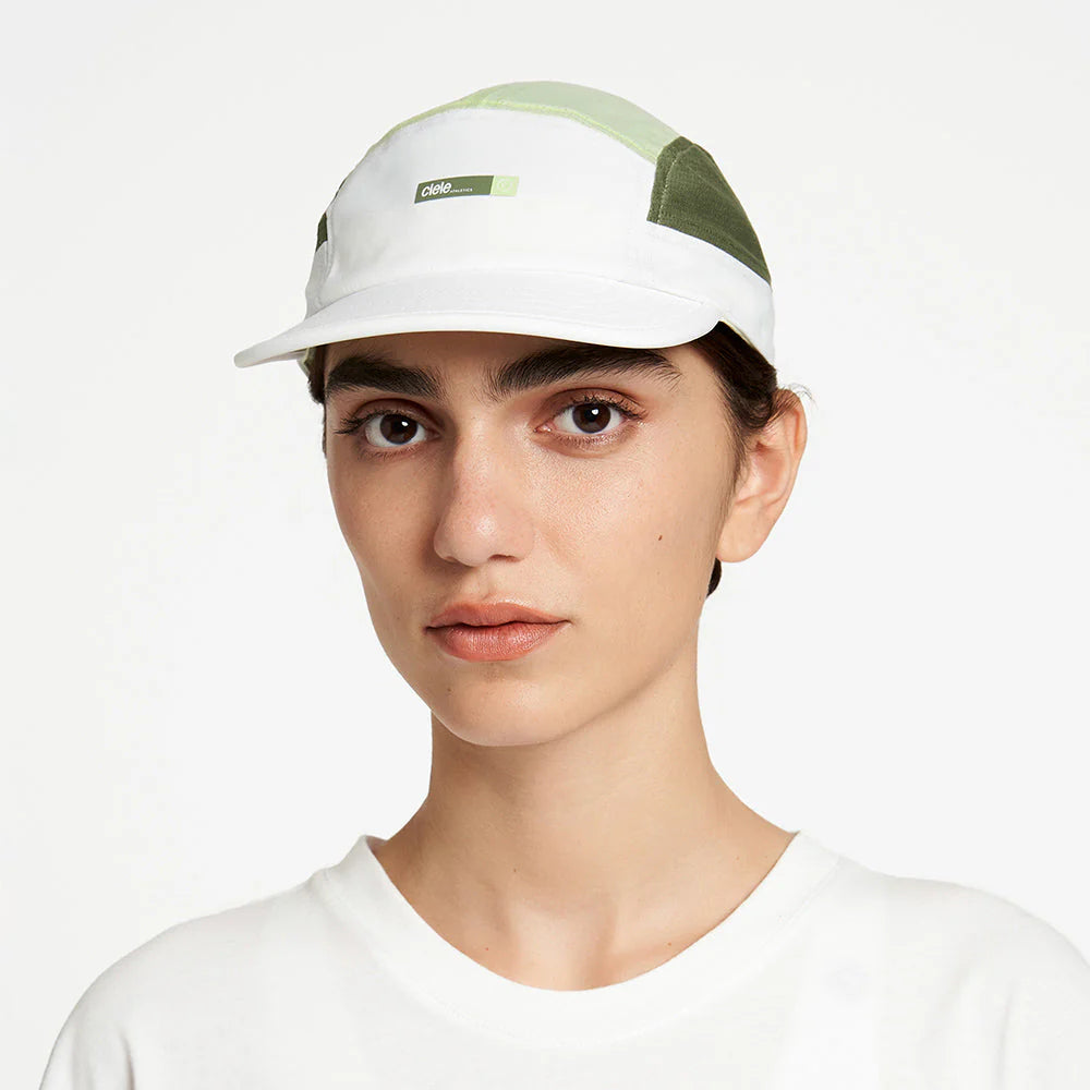 Ciele Athletics ALZCap - in Willow worn by a woman on a neutral background from the front.