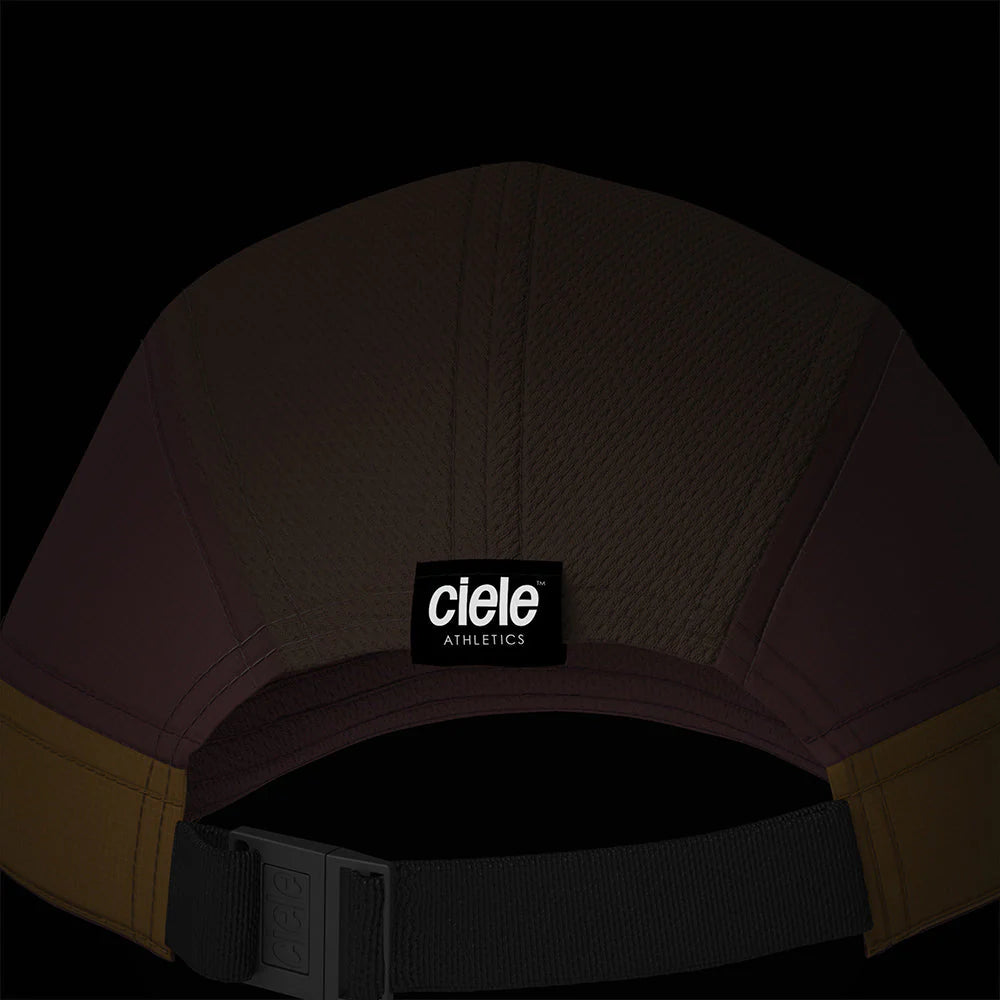 Ciele Athletics ALZCap SC in Arabica from the rear on a dark background.