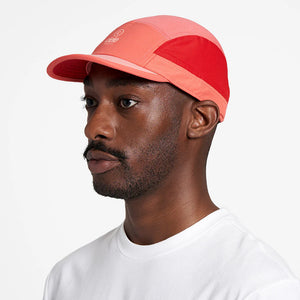 Ciele Athletics ALZCap SC in Topograph worn by a man on a neutral background from the side.