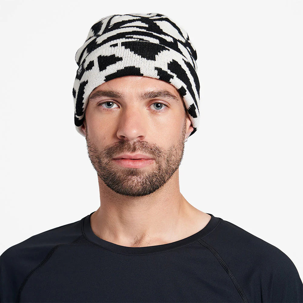 Ciele Athletics CLNBeanie - All Over Loopy Tile in Whitaker worn by a man on a neutral background.