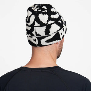 Ciele Athletics CLNBeanie - All Over Loopy Tile in Whitaker worn from the rear on a neutral background.