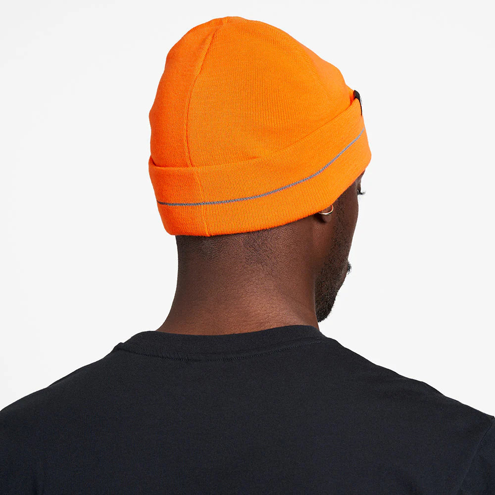 Ciele Athletics CR3Beanie trail running beanie in Spectro worn by a man from the rear on a neutral background.