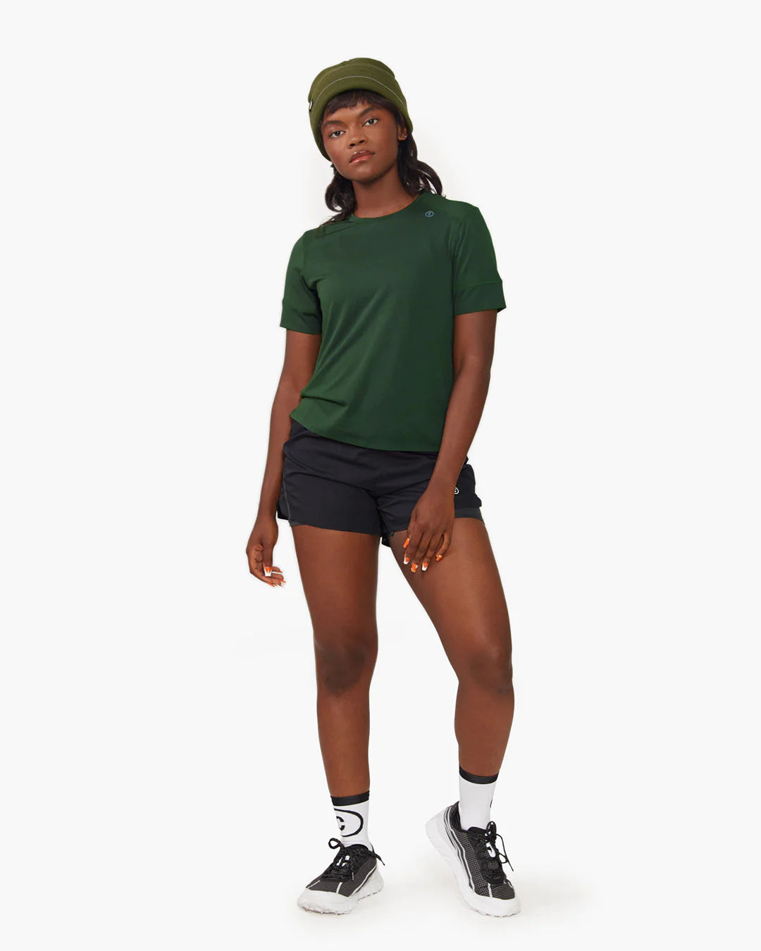 Ciele Athletics CR3Beanie in Boreal worn by a woman on a neutral background.