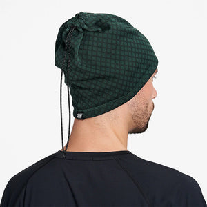 Ciele Athletics DOSBeanie winter running beanie and gaiter in Janium worn by a man from the rear on a neutral background.