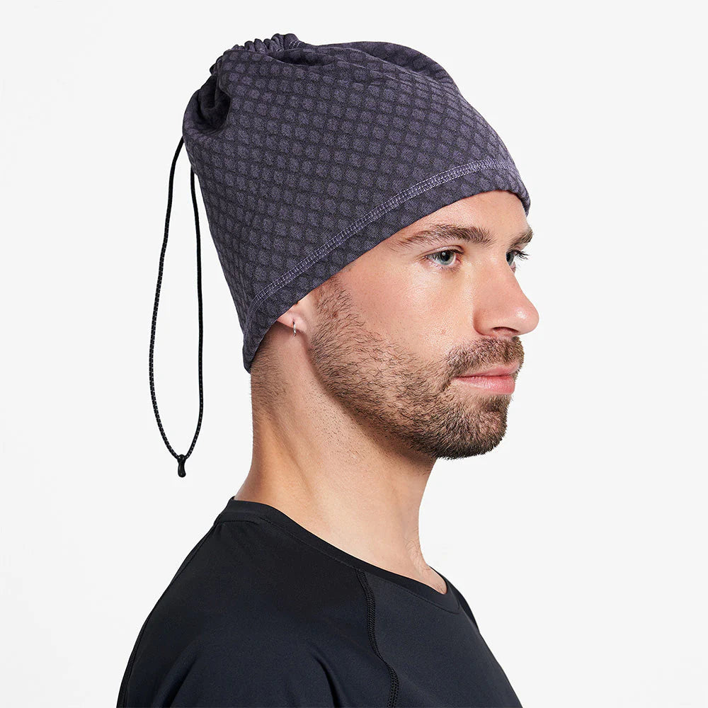 Ciele Athletics DOSBeanie winter running beanie and gaiter in Astronautic worn by a man on a neutral background.