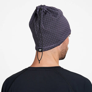 Ciele Athletics DOSBeanie winter running beanie and gaiter in Astronautic worn by a man from the rear on a neutral background.