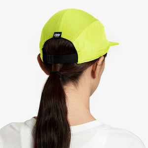 Ciele Athletics ALZCap - Athletics SL in Polaris worn by a woman from the rear on a neutral background.