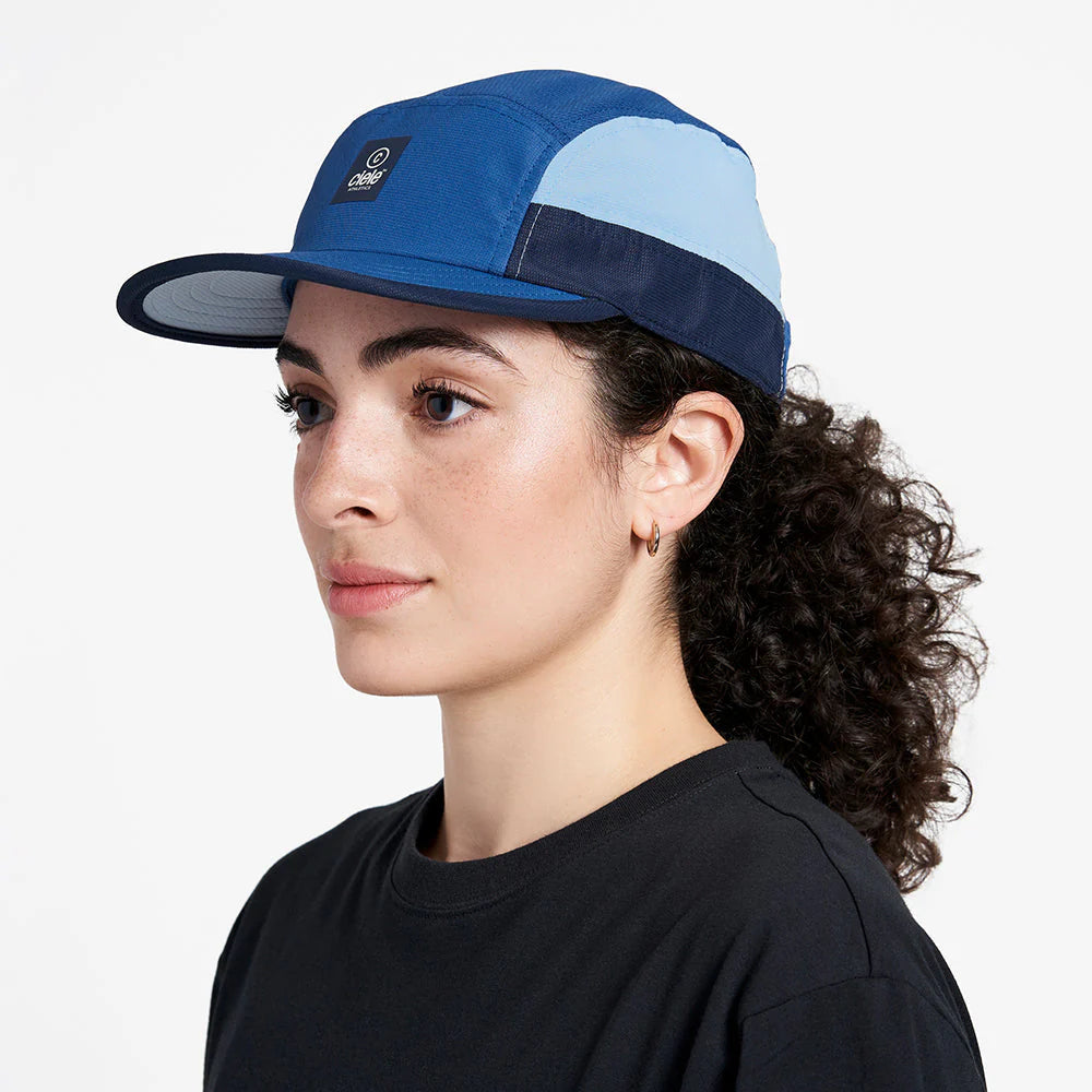 Ciele Athletics GOCap SC - C Plus Box in Ablazi worn by a woman from the side on a neutral background.