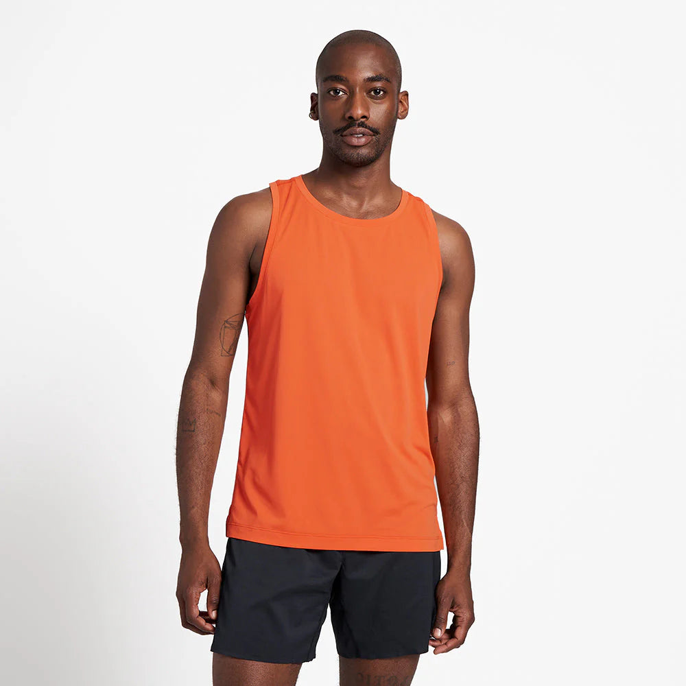 Ciele Athletics M DLYSinglet in Pulp worn by a man from the front on a neutral background.