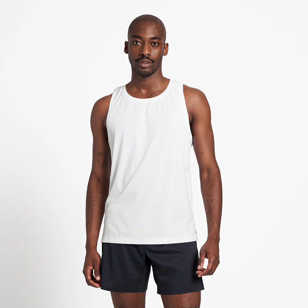 Ciele Athletics M DLYSinglet in Ghost worn by a man from the front on a neutral background.