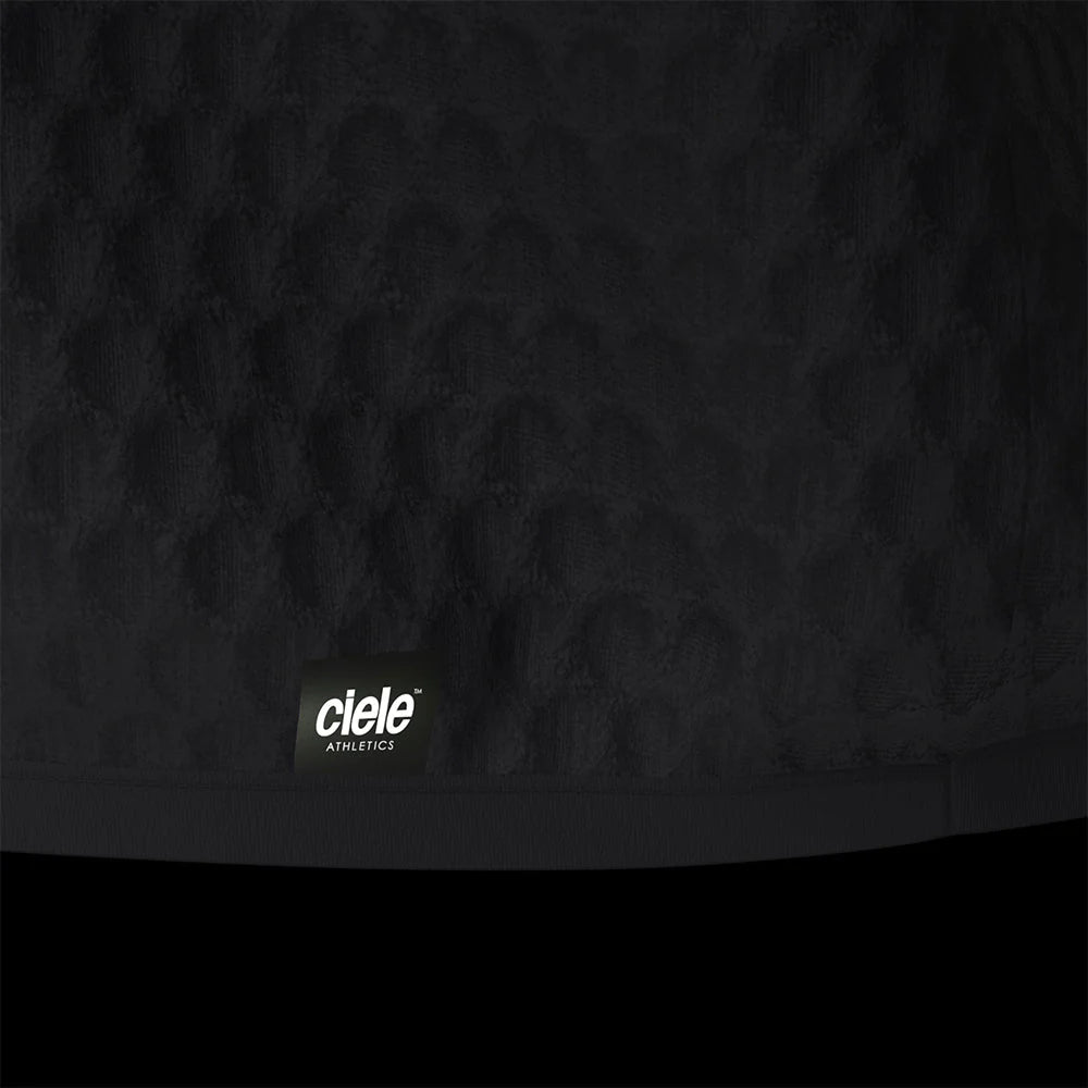 Ciele Athletics Unisex VLVMockneck cold weather running sweatshirt in Shadowcast on a dark background.