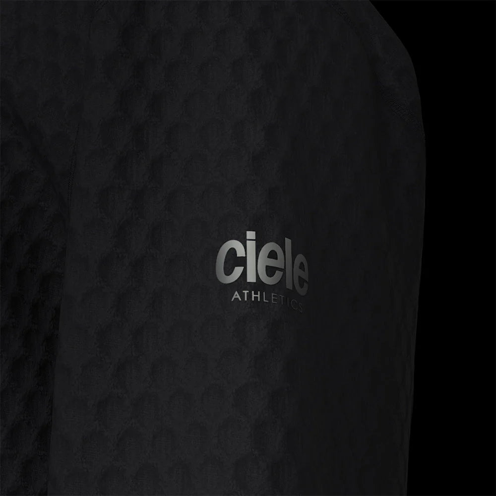 Ciele Athletics Unisex VLVMockneck cold weather running sweatshirt in Shadowcast on a dark background.