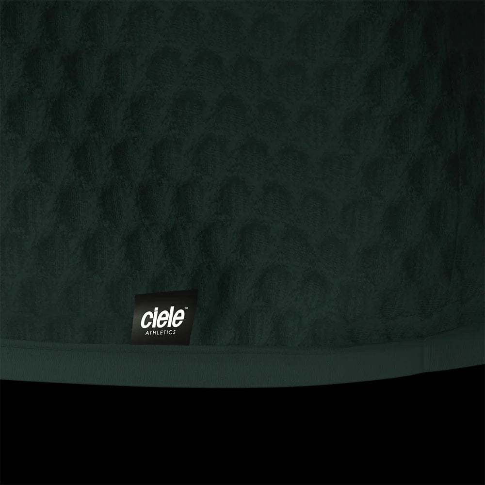 Ciele Athletics Unisex VLVMockneck cold weather running sweatshirt in Janium on a dark background.