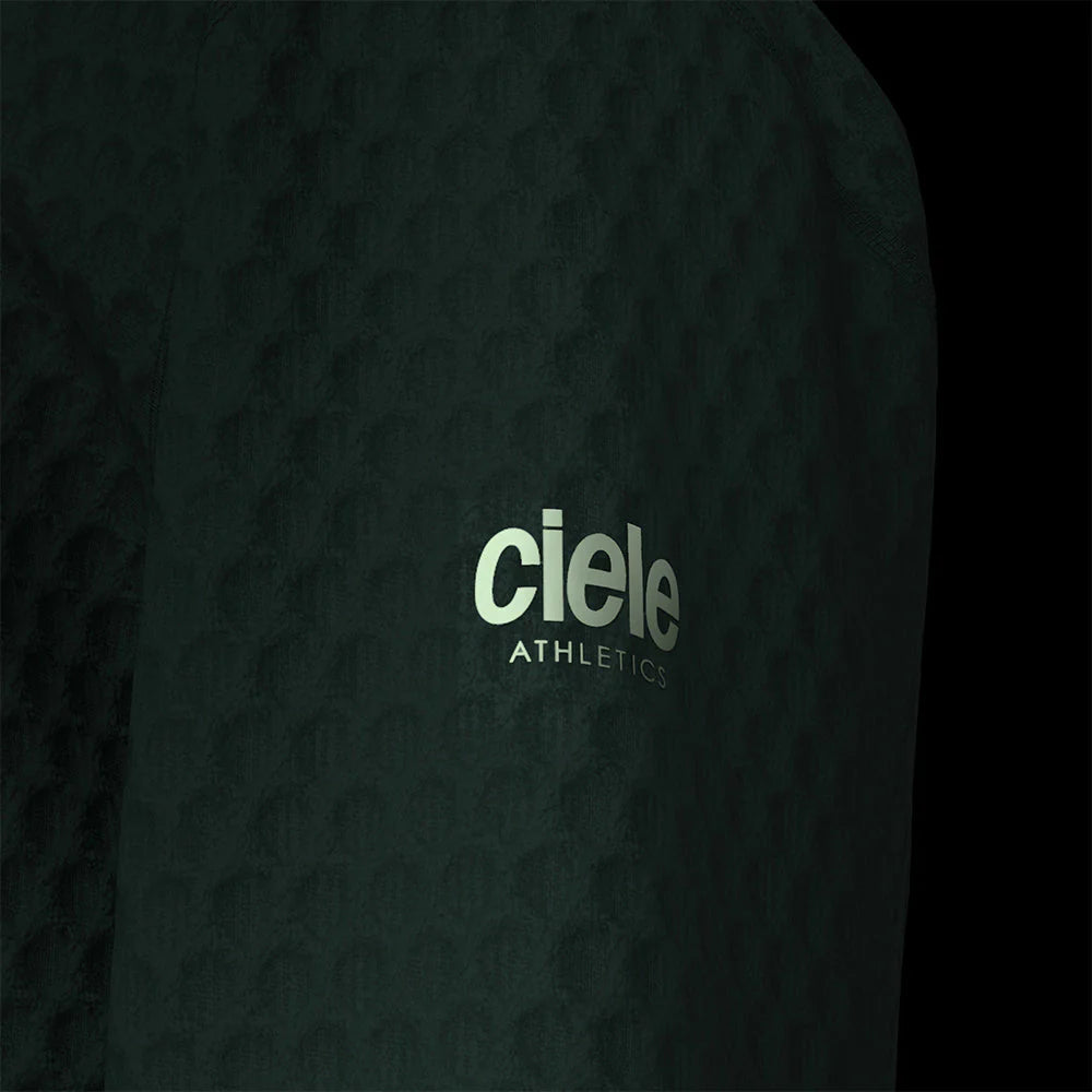 Ciele Athletics Unisex VLVMockneck cold weather running sweatshirt in Janium on a dark background.