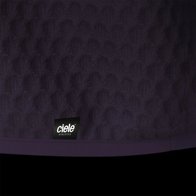 Ciele Athletics Unisex VLVMockneck cold weather running sweatshirt in Astronautic on a dark background.