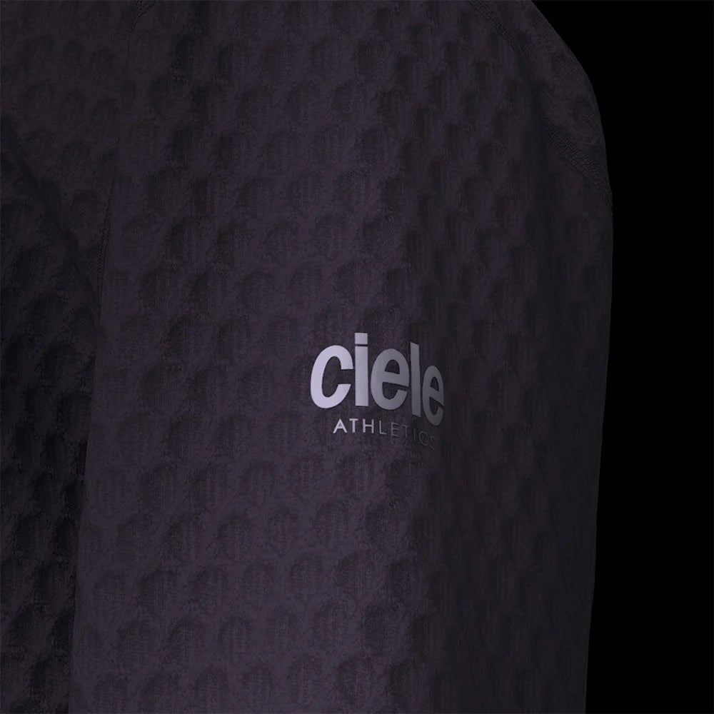 Ciele Athletics Unisex VLVMockneck cold weather running sweatshirt in Astronautic on a dark background.