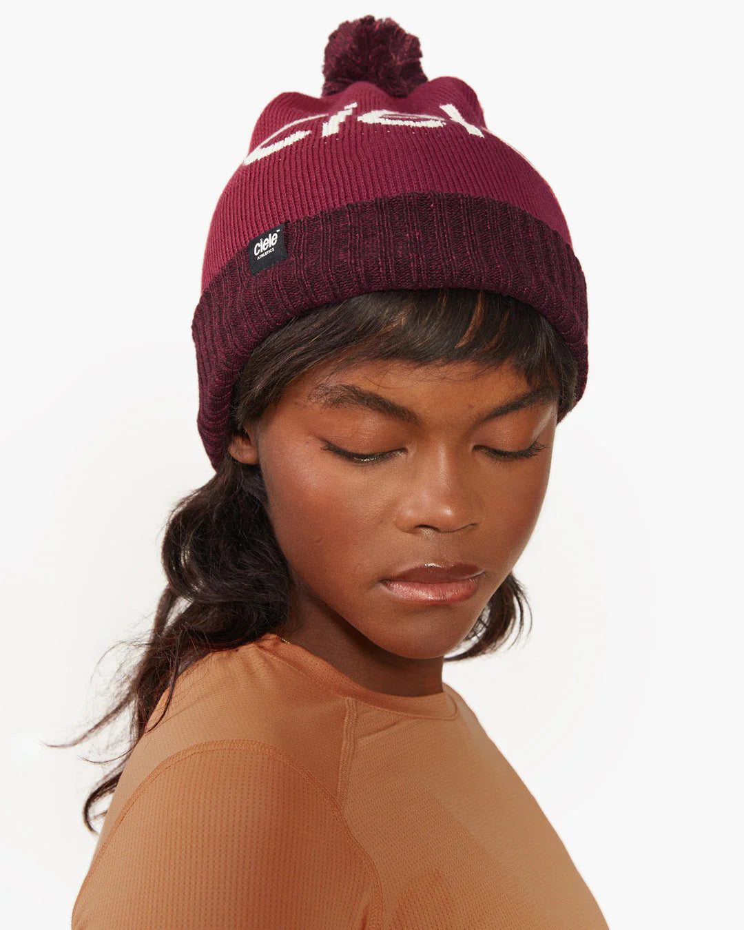 Ciele CLXCBeanie in Red Oak worn against a neutral background.