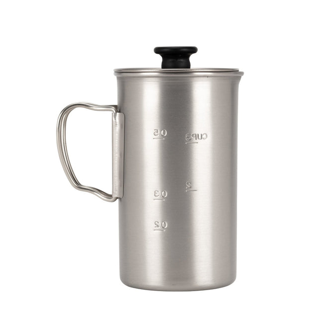 Snow Peak Titanium French Press for camp coffee on a neutral background.